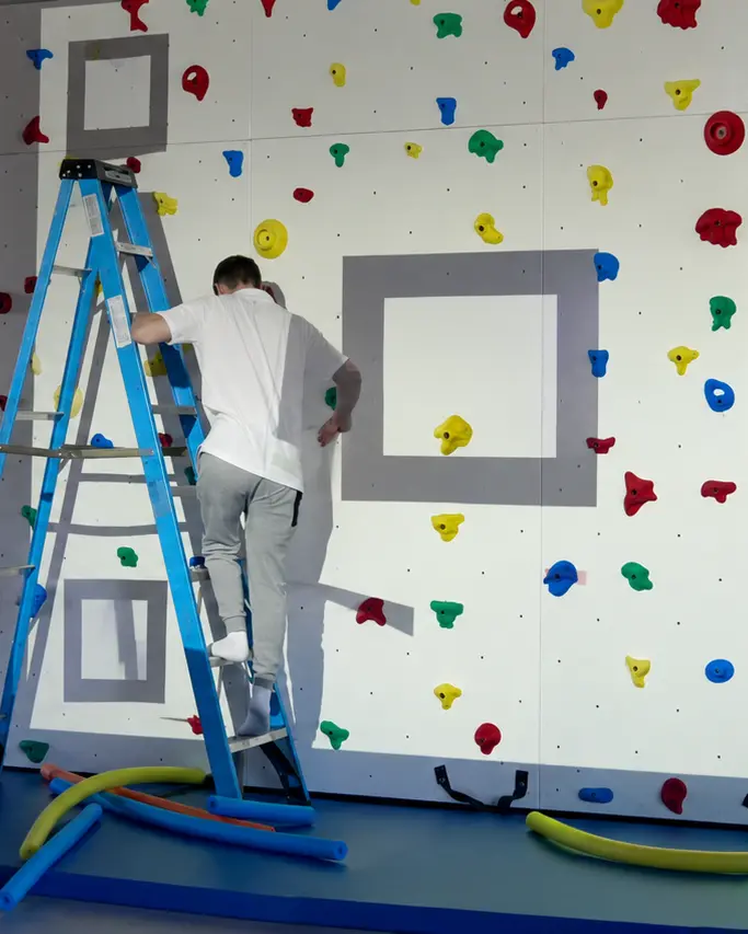 Interactive climbing wall installation