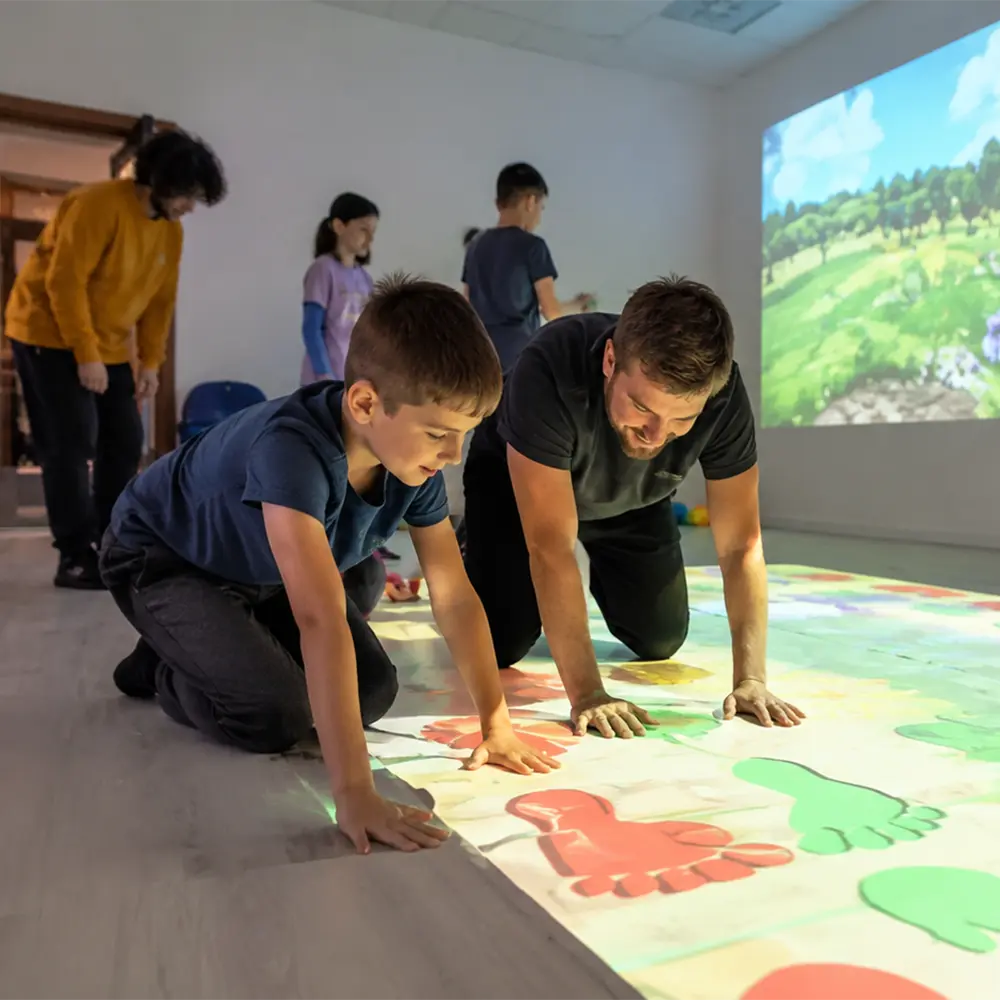 Teen using interactive floor